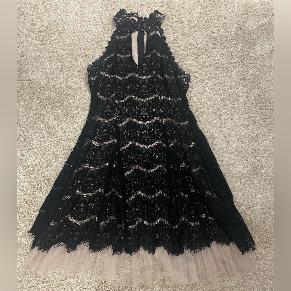 Francesca’s black lace dress